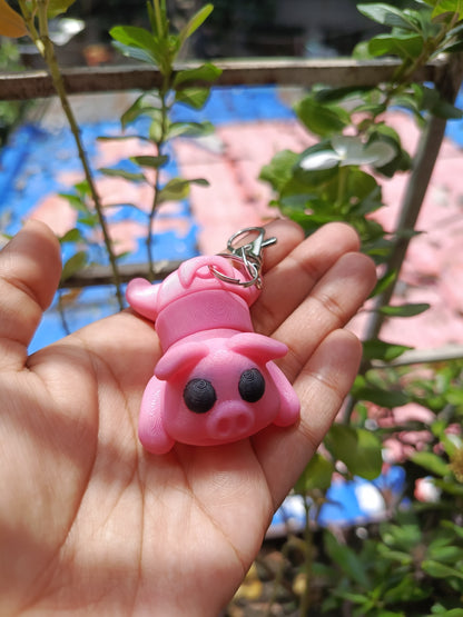 Pig with black eyes keychain