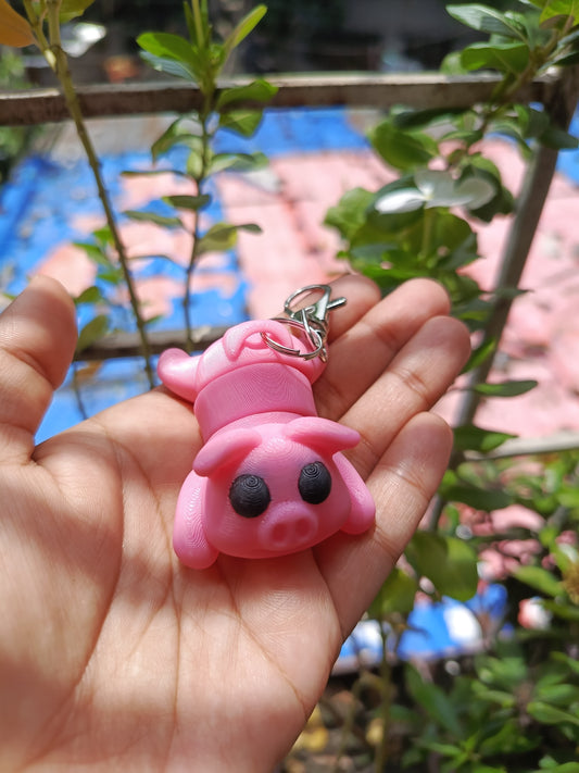 Pig with black eyes keychain
