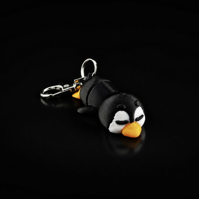 Sleepy penguin keychain