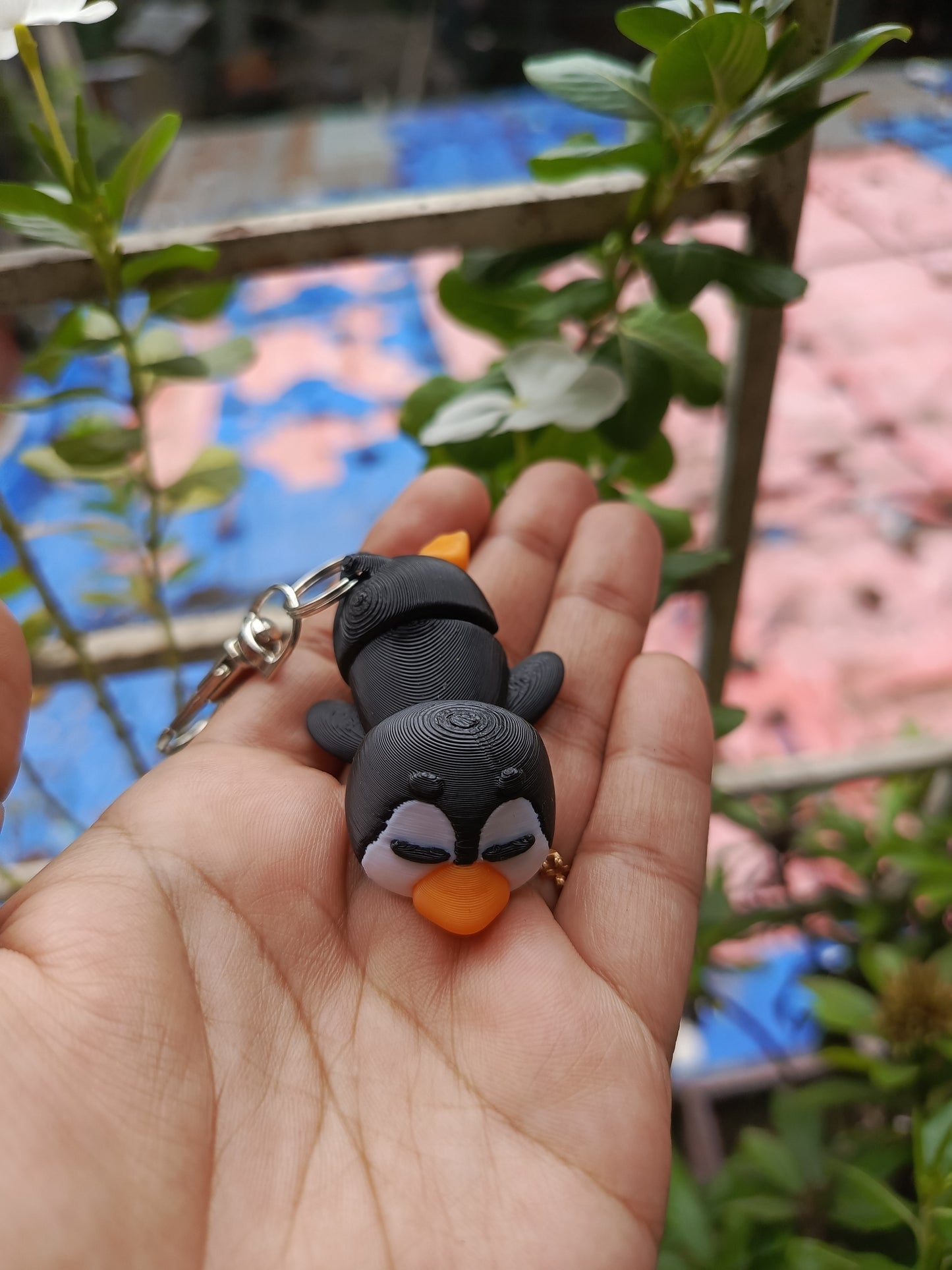 Sleepy penguin keychain