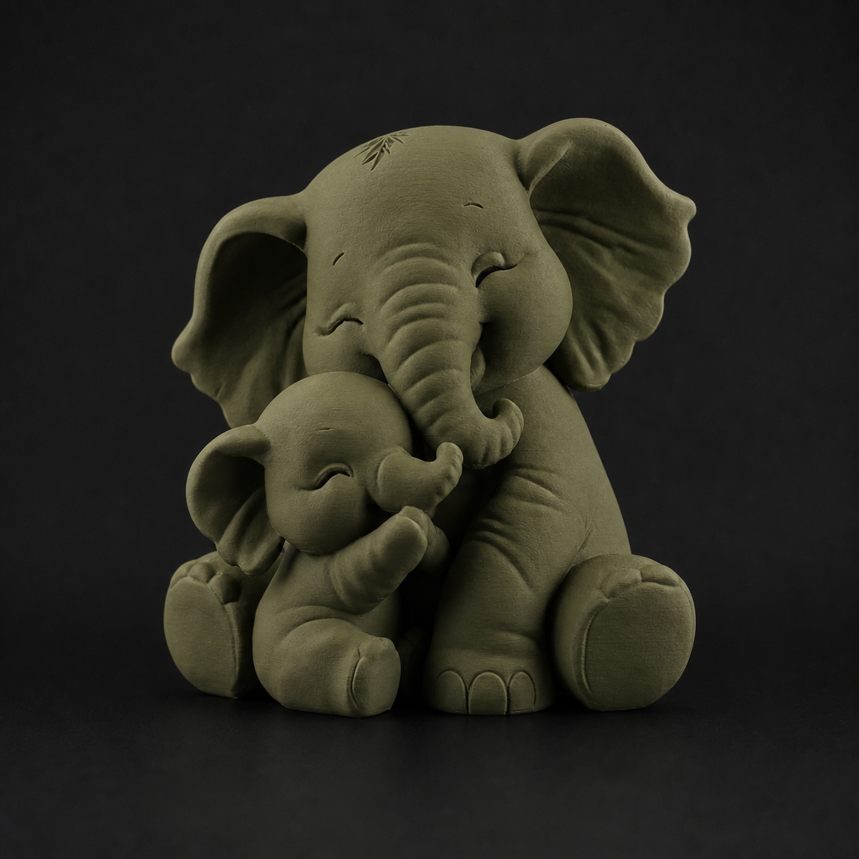 Baby elephant hug sculpture in dark green