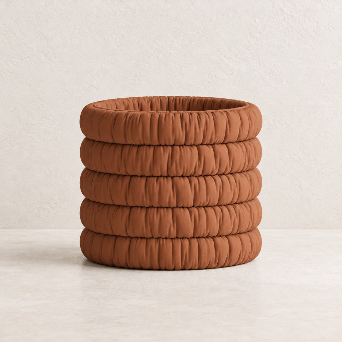 Mossmallow Planter in Terracotta (#A15636), empty pot with warm plaster background and pale tabletop