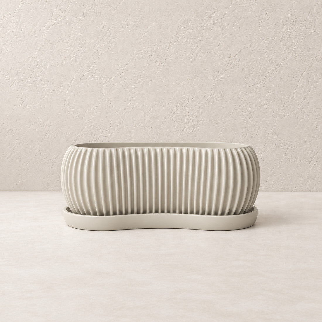 Sagefold Planter in Bone White #CBC6B8; matching color on planter body and tray