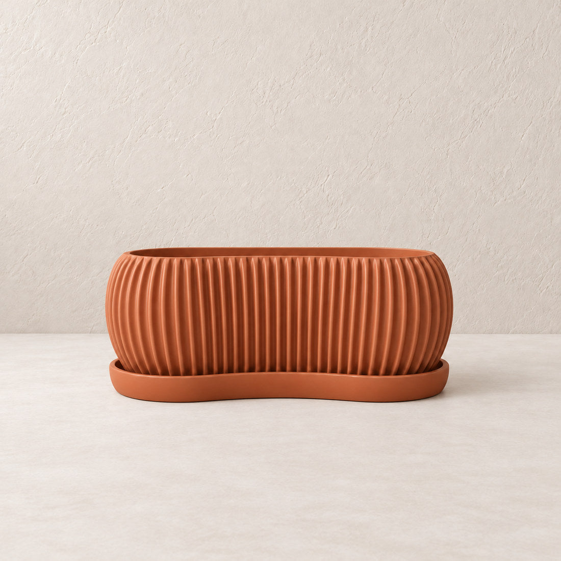 Sagefold Planter in Terracotta #A15636; matching color on planter body and tray