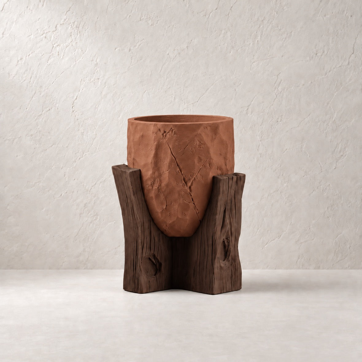 Sunveil Planter in Terracotta (#A15636) with cocoa-brown wood-look base, matching neutral plaster background and centered product placement